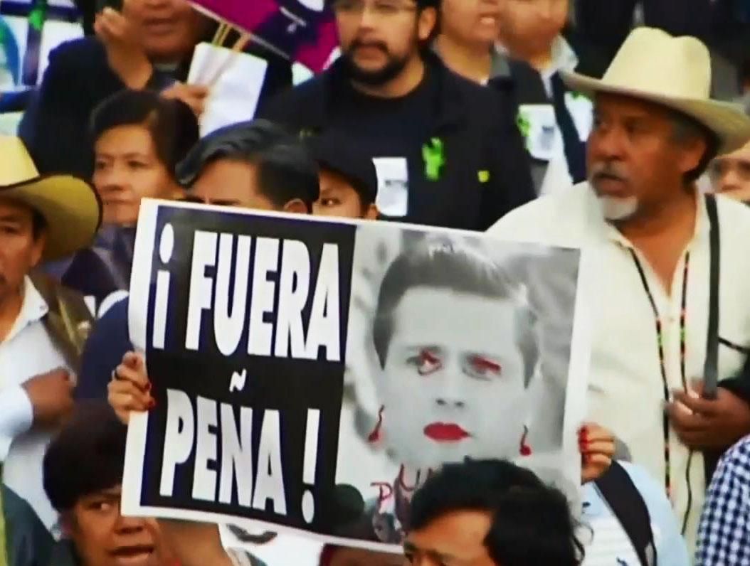 В Мехико многотысячный мирный митинг перерос в погромы