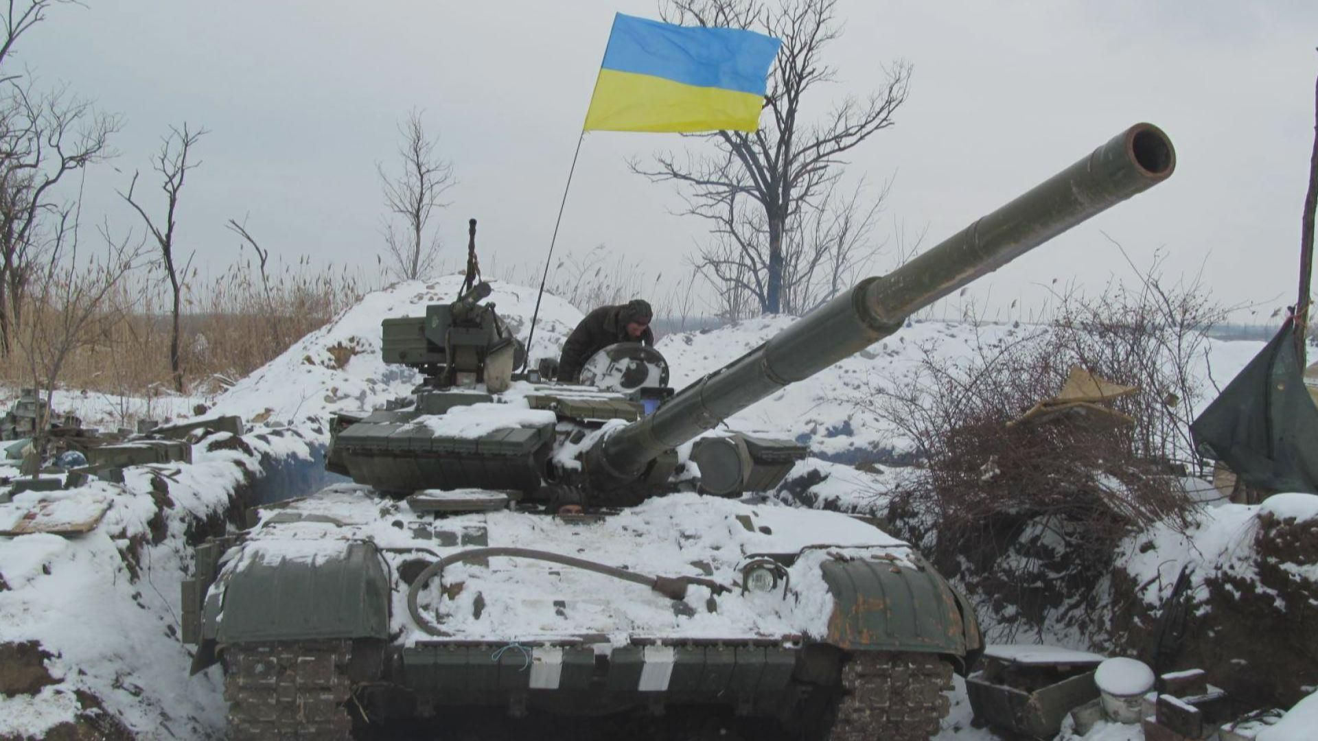 Військові три місяці обороняють прапор на території бойовиків Військові три місяці обороняють прапор на території бойовиків