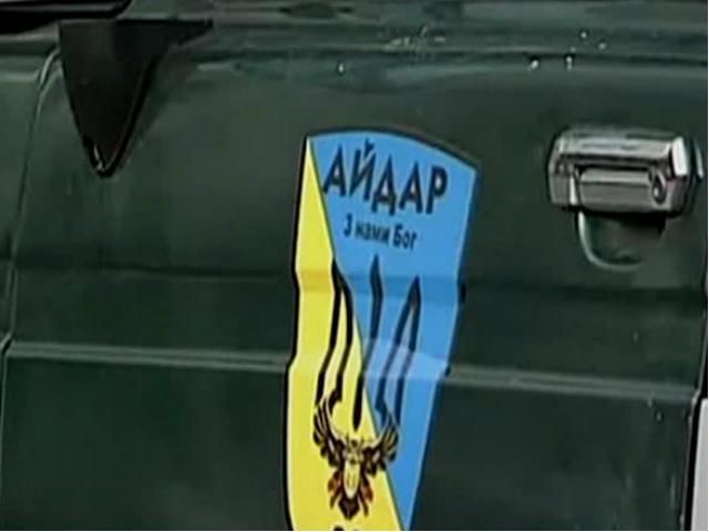 На Луганщині затримали бандитів, які видавали себе за бійців "Айдару" На Луганщині затримали бандитів, які видавали себе за бійців "Айдару"