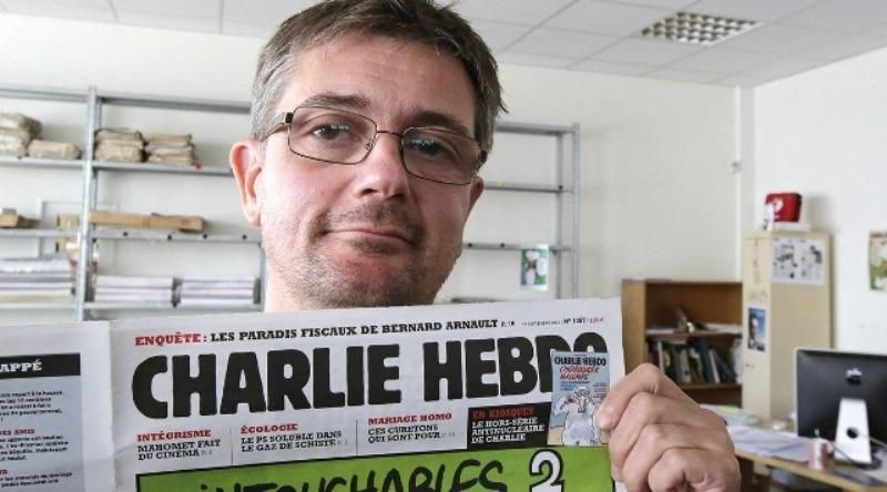 Журналисты Charlie Hebdo посвятили одну из карикатур аннексии Крыма Журналисты Charlie Hebdo посвятили одну из карикатур аннексии Крыма