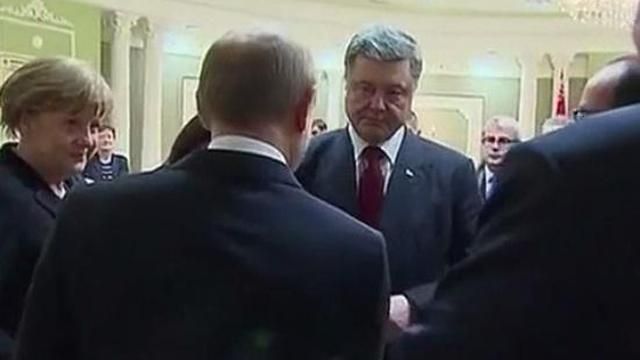 Журналісти підгледіли, що Порошенко з Путіним розмовляють дуже емоційно