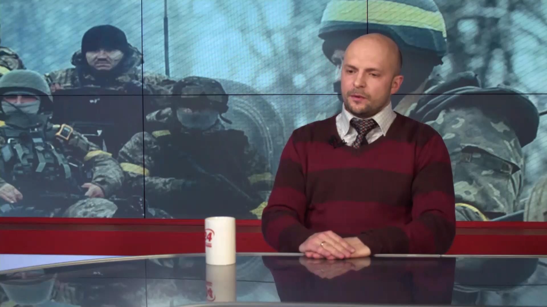 Бойовики роблять видимість відведення озброєння, — Полевий Бойовики роблять видимість відведення озброєння, — Полевий