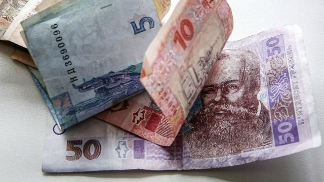 Прем'єр сказав, що стабілізує гривню Прем'єр сказав, що стабілізує гривню