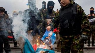 Найактуальніші кадри 3 березня: палаюче фото Путіна, розгромлена церква