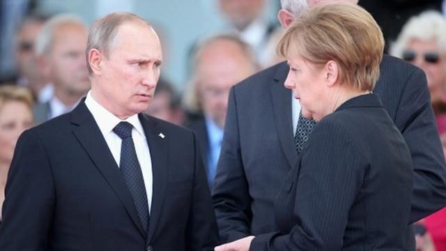 Меркель намагається залякати Путіна