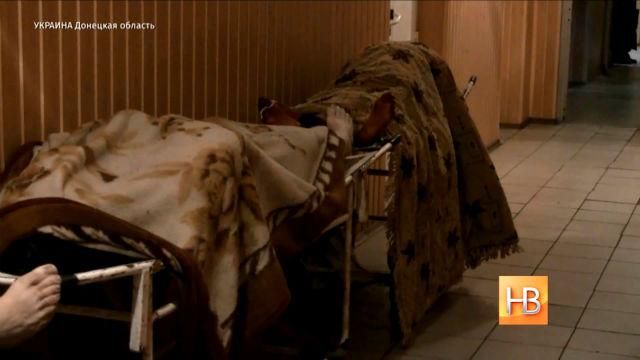 Як в терористичній "ДНР" ховають тіла українських бійців Як в терористичній "ДНР" ховають тіла українських бійців