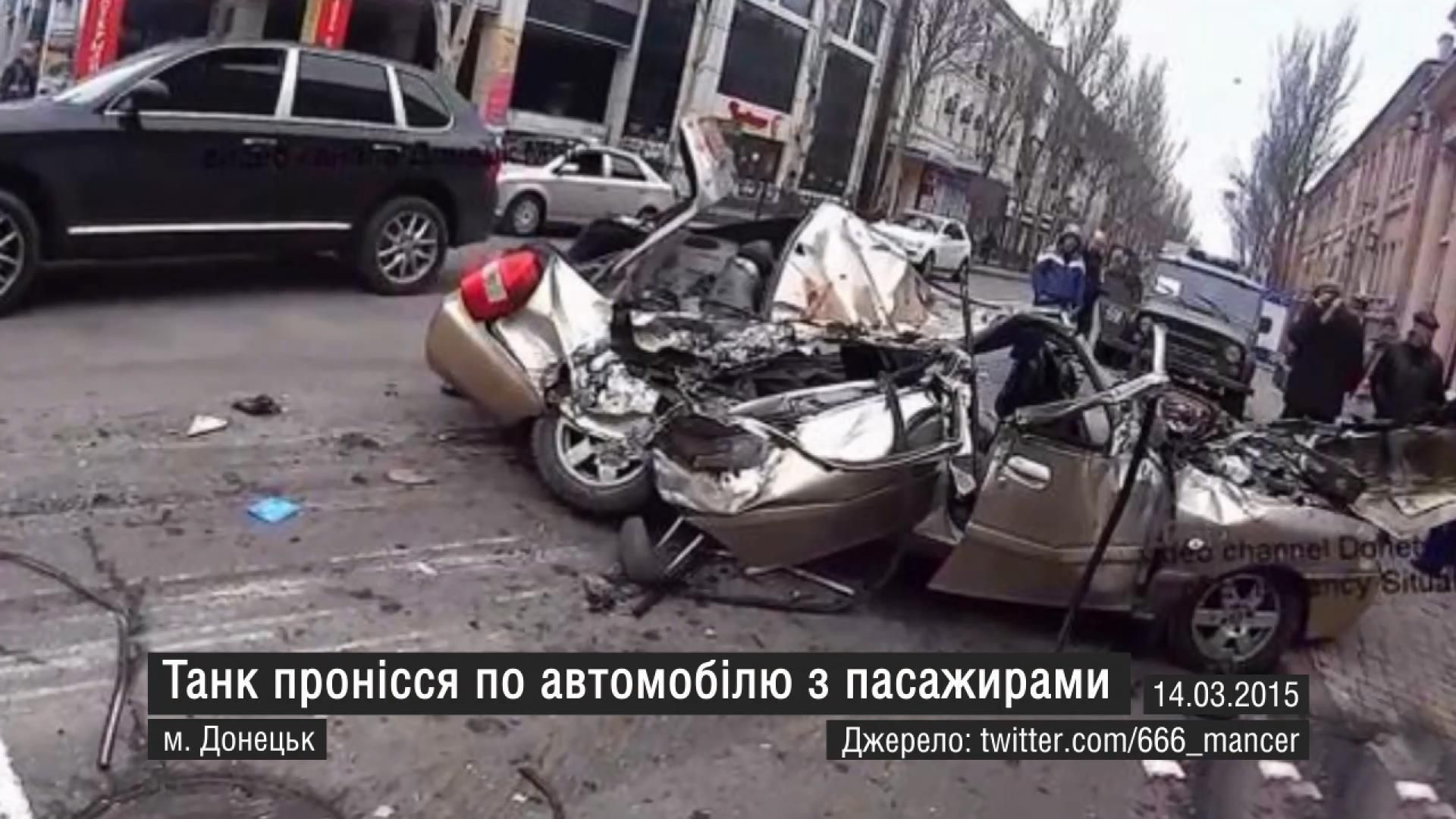 Найактуальніші кадри 14 березня: танк розчавив машину, у Маріуполі створили "живий ланцюг" Найактуальніші кадри 14 березня: танк розчавив машину, у Маріуполі створили "живий ланцюг"