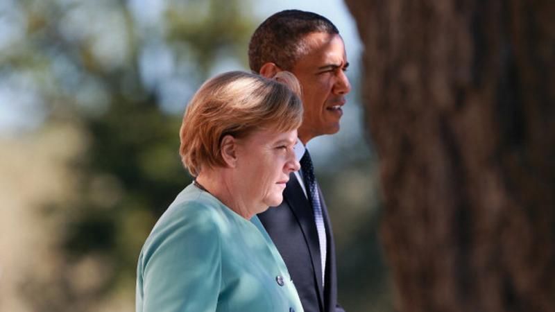 Обама и Меркель договорились не ослаблять санкции до выполнения Россией минских договоренностей
