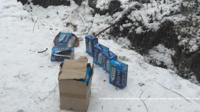 Вблизи границы с Россией нашли ящики с элитной водкой Вблизи границы с Россией нашли ящики с элитной водкой
