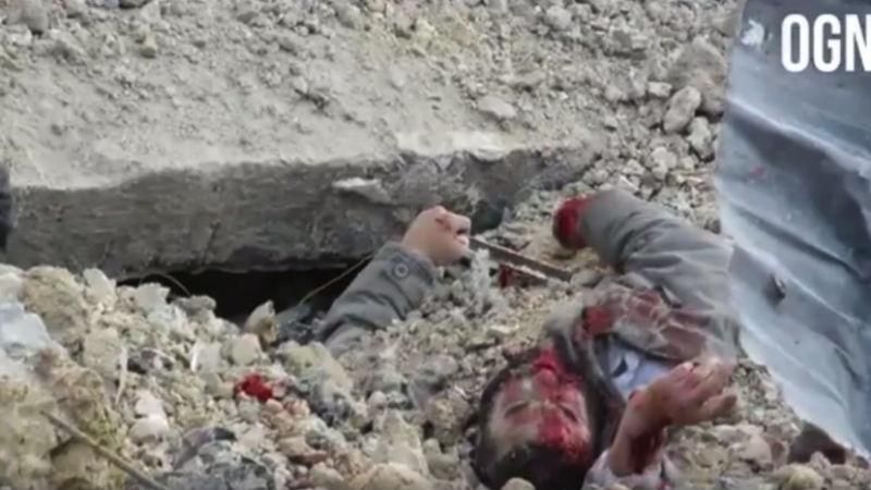 В сети появились жуткие кадры последствий последнего авиаудара РФ по Сирии (18) В сети появились жуткие кадры последствий последнего авиаудара РФ по Сирии (18)