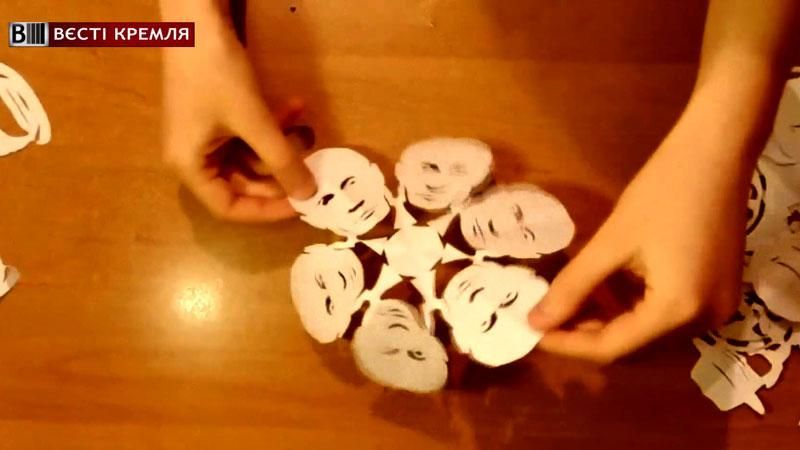 Новорічний маразм: дітям пропонують замість сніжинок вирізати портрет Путіна