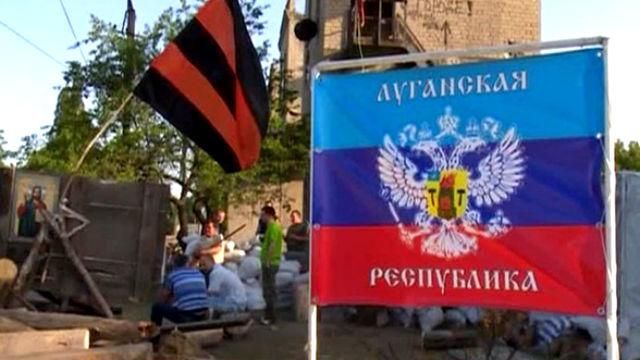 В окупованому Луганську так звана "поліція" обчистила перехожого В окупованому Луганську так звана "поліція" обчистила перехожого