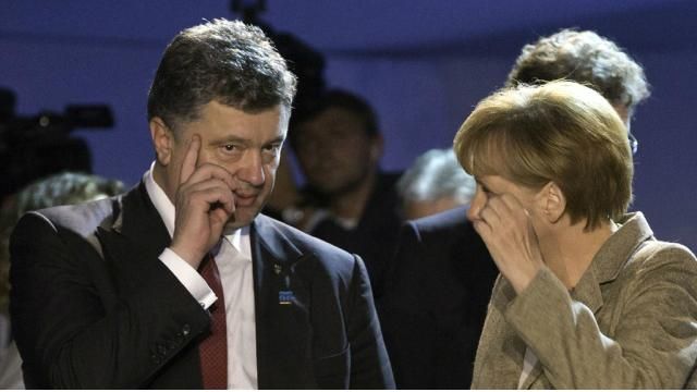 Порошенко обговорив з Меркель і Олландом, що далі робити з мінськими домовленостями 
