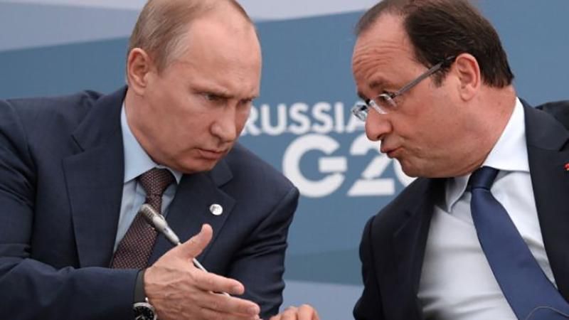 Путин позвонил Меркель и Олланду и попросил активнее "влиять" на Порошенко