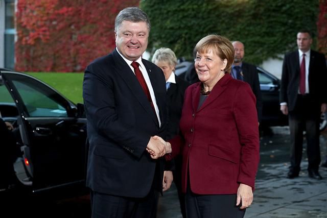 Порошенко не пожал руку Путину в Берлине Порошенко не пожал руку Путину в Берлине