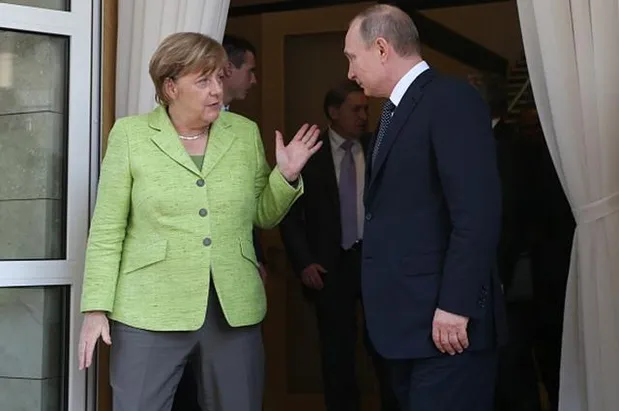 Меркель зустрілася з Путіним