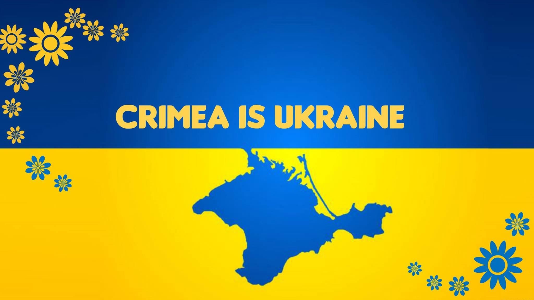 Фото дня: дівчина у вишиванці торгує віночками в анексованому Криму 