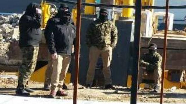 Люди у балаклавах – прості будівельники, – в поліції прокоментували конфлікт на аеродромі ЗСУ