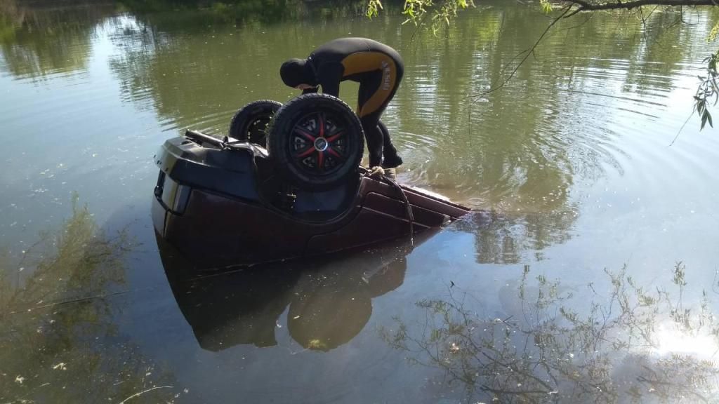 Женщина утонула вместе с машиной в Запорожье: фото
