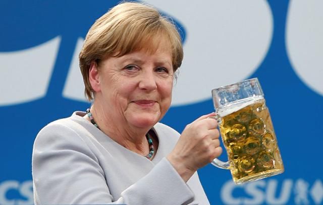 Меркель может поехать в Россию на ЧМ-2018