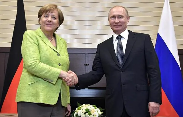Меркель Путін зустріч