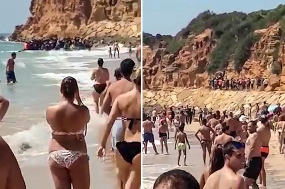 Полсотни мигрантов "взяли штурмом" пляж с туристами на побережье Испании: видео