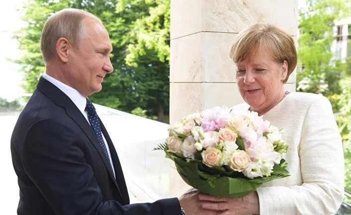 Меркель Путін війна на Донбасі