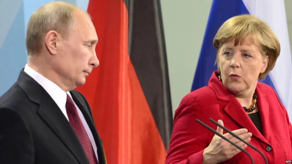 Путін Меркель війна на Донбасі