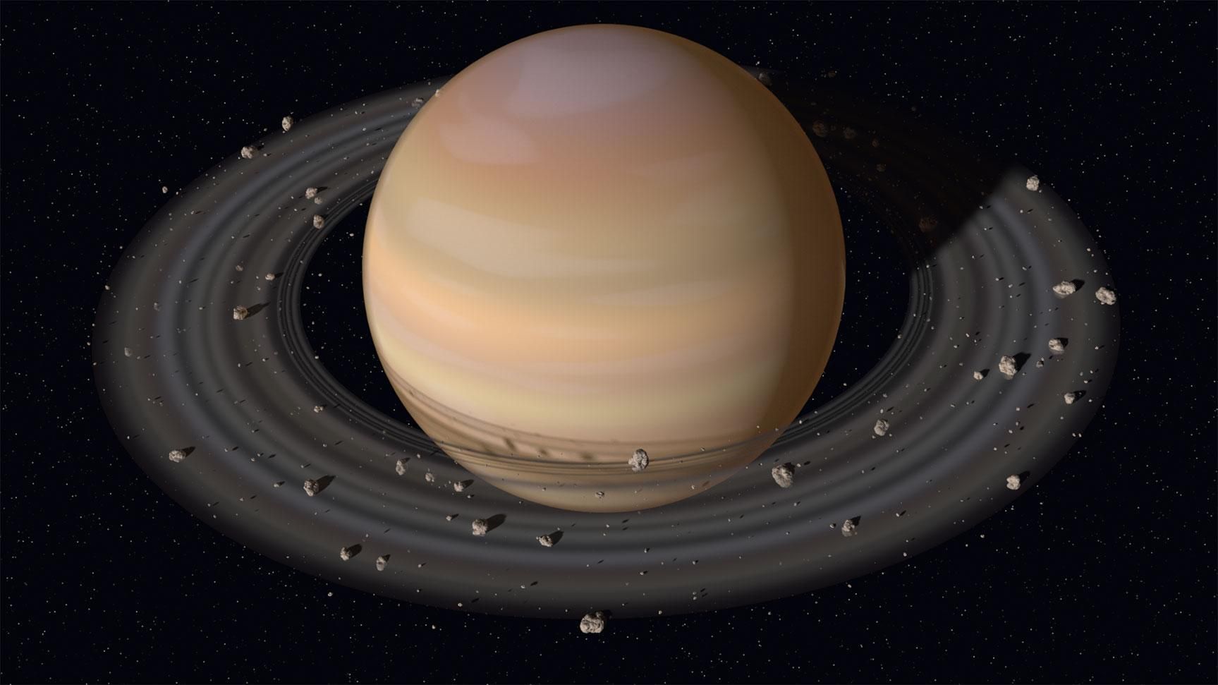 Ученые объяснили, почему спутники Сатурна имеют разную окраску