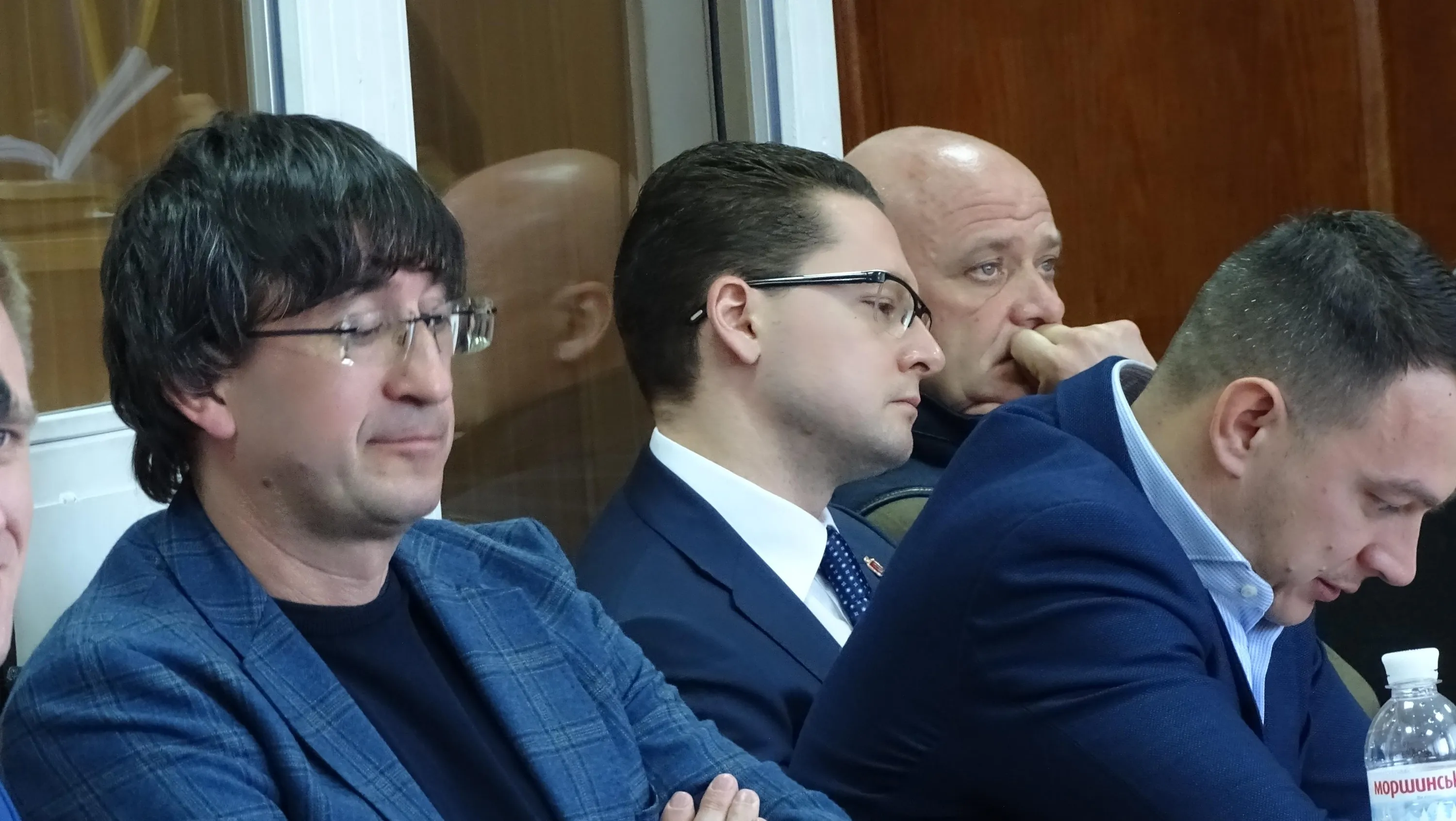 Обвинувачені Василь Шкрябай, Павло Вугельман, Геннадій Труханов та захисник Тарас Пошиванюк. Обвинувачені Василь Шкрябай, Павло Вугельман, Геннадій Труханов та захисник Тарас Пошиванюк.