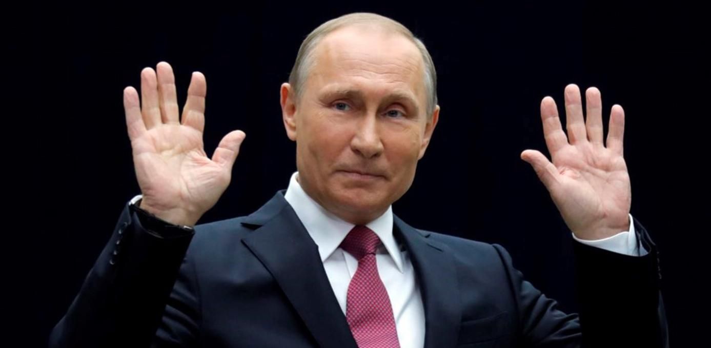 Росіянин заплатить штраф, бо сфотографував напис на стіні із образою Путіна Росіянин заплатить штраф, бо сфотографував напис на стіні із образою Путіна