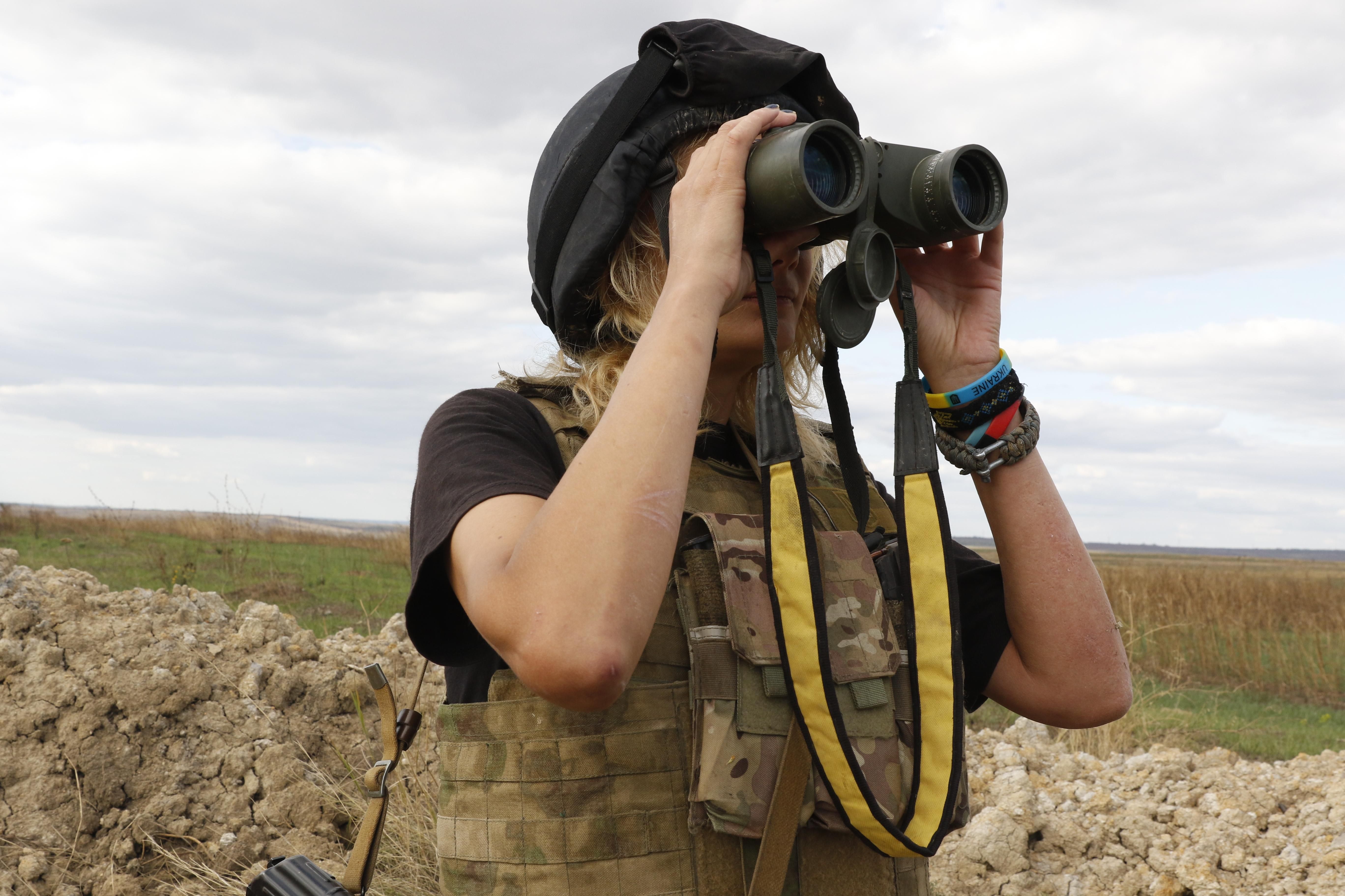 Боевики РФ вывесили украинский флаг на своих позициях Боевики РФ вывесили украинский флаг на своих позициях