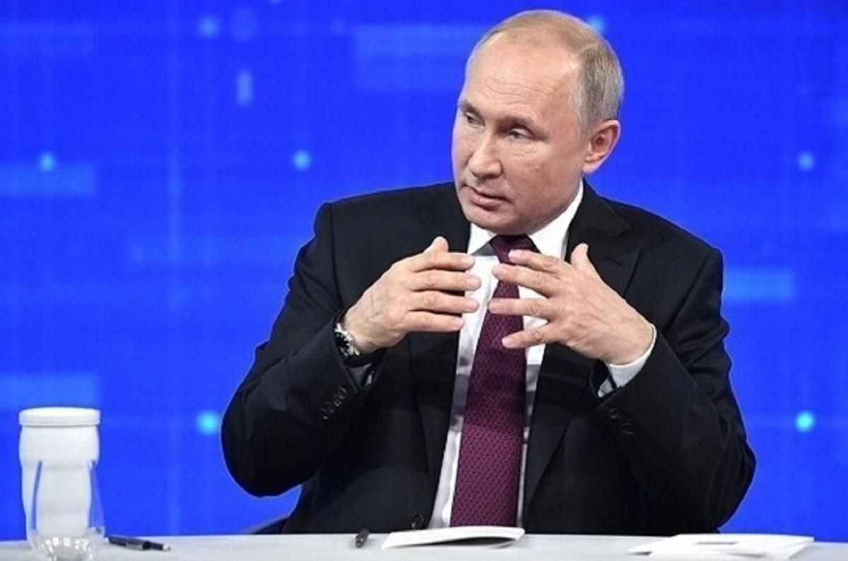 Путин в Париже: Украина должна амнистировать боевиков и изменить Конституцию