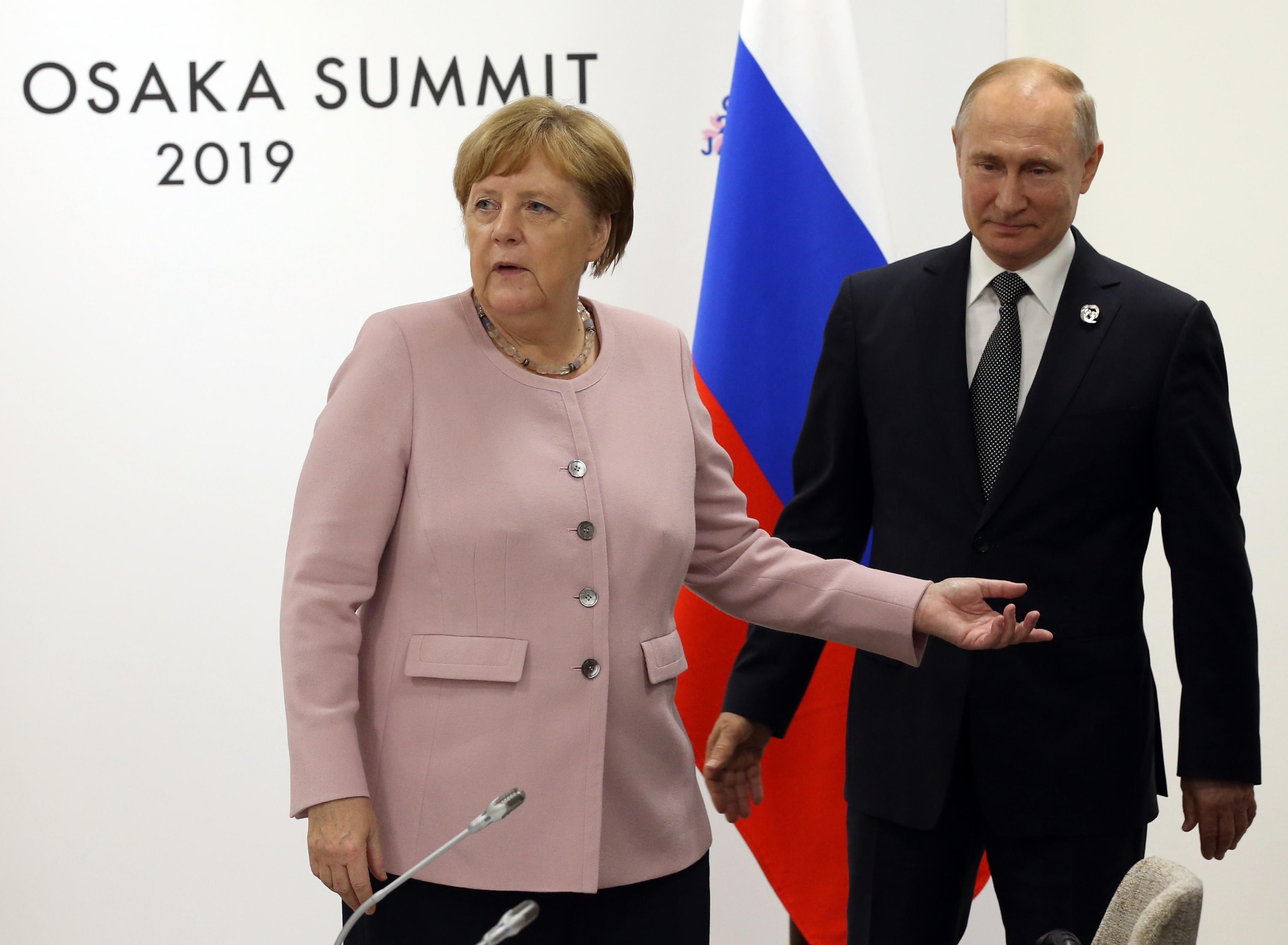 Ангела Меркель и Владимир Путин на саммите в Осаке