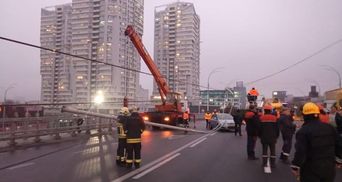 Пошкоджені автомобілі на Шулявському мості: хто понесе відповідальність