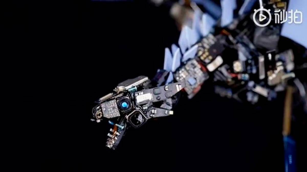 Блогер розібрав Xiaomi Mi 11 до гвинтика та склав з нього дракона Блогер розібрав Xiaomi Mi 11 до гвинтика та склав з нього дракона