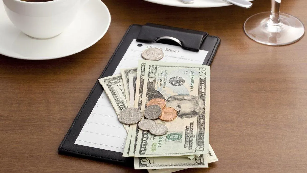 Розраховуватися у ресторані Розраховуватися у ресторані