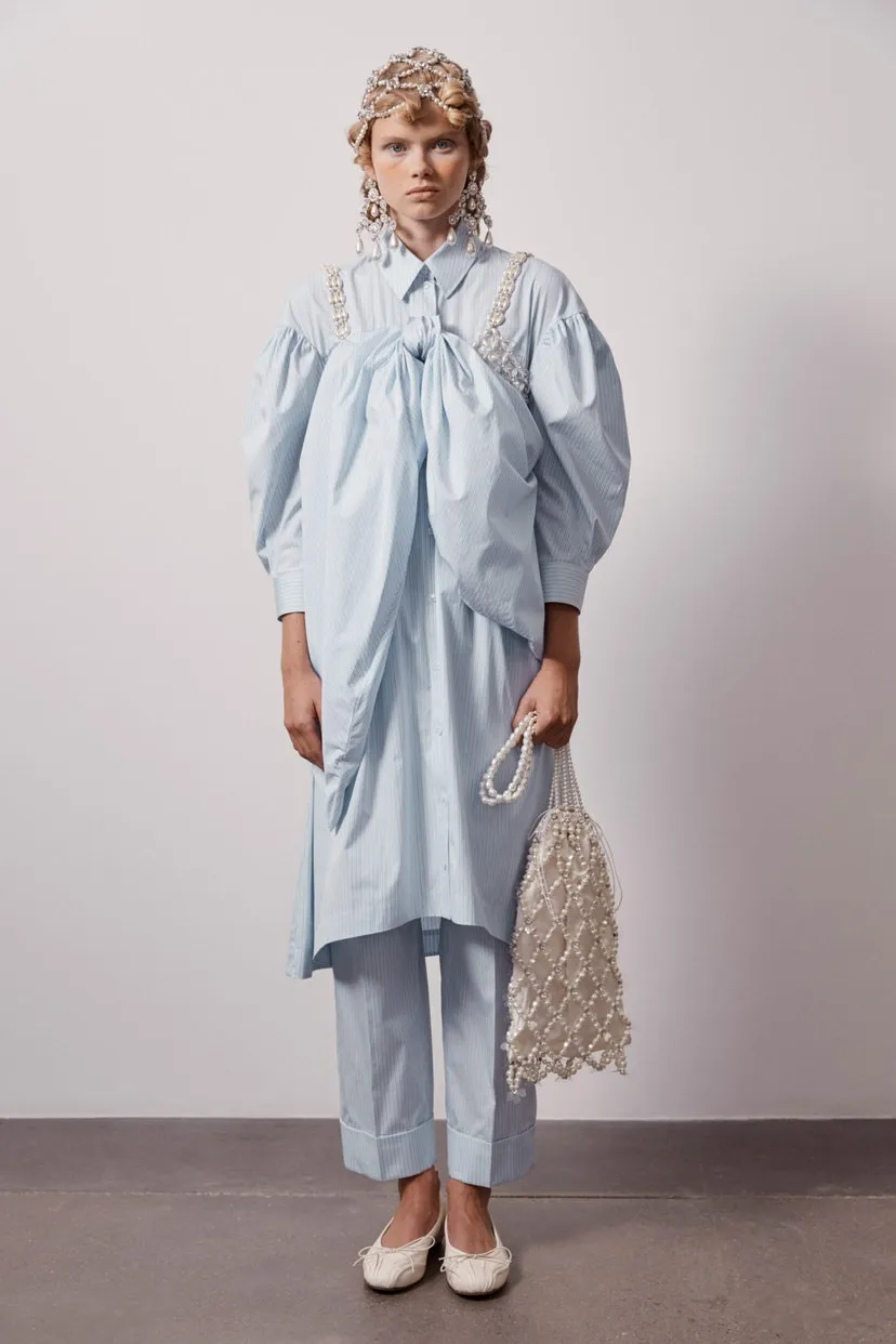 Тренд навіяний арабською модою – сукня поверх штанів