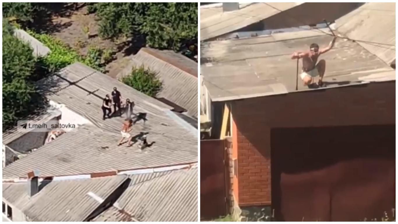 В Харькове мужчина устроил драку на крыше с полицией - видео В Харькове мужчина устроил драку на крыше с полицией - видео