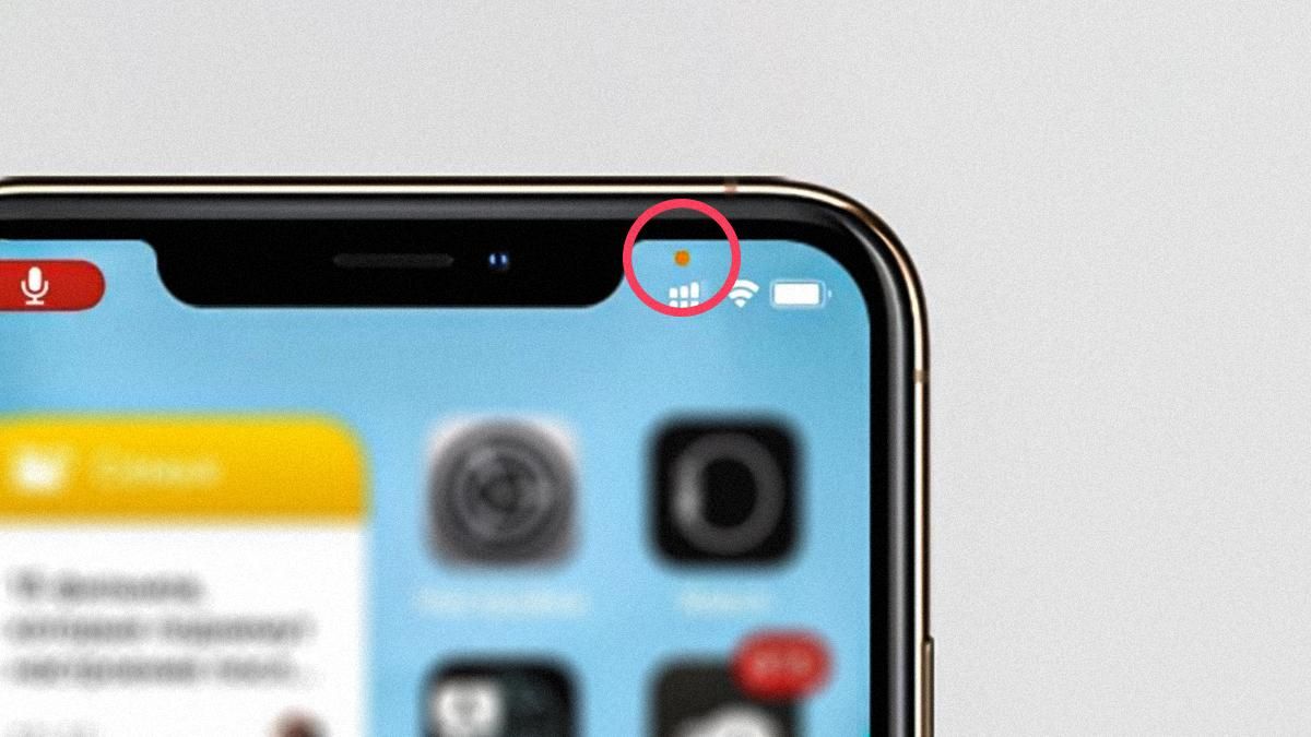 Зелена і помаранчева крапки на екрані iPhone: що означають