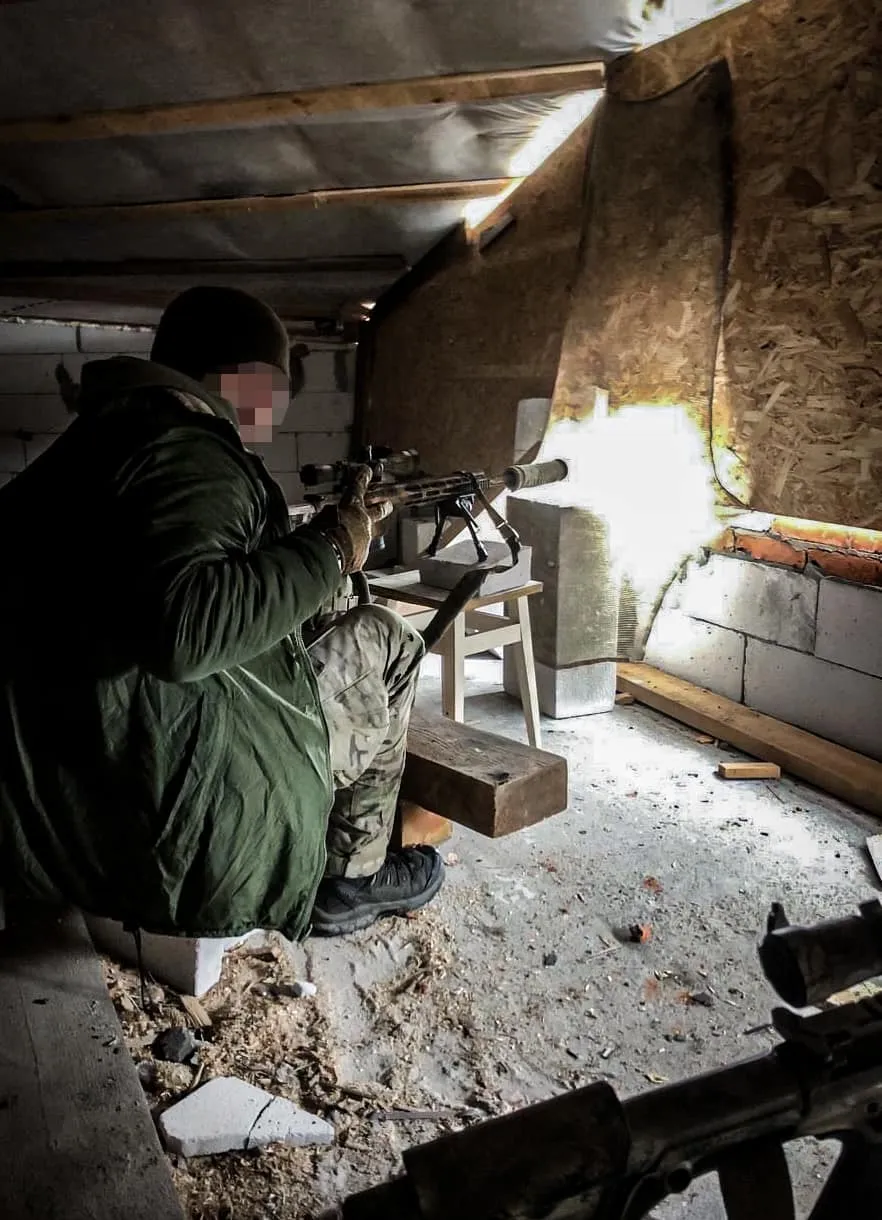Снайпер ССО на своїй позиції Снайпер ССО на своїй позиції