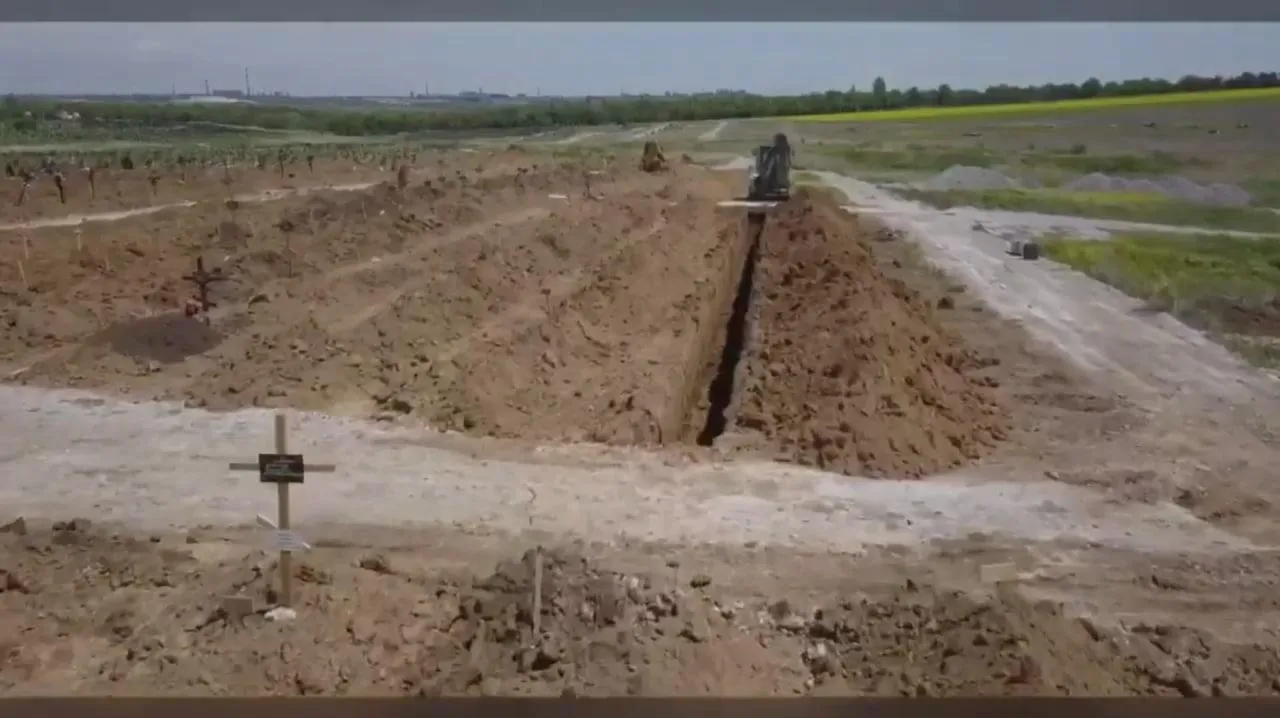 Массовые захоронения в Мариуполе Массовые захоронения в Мариуполе