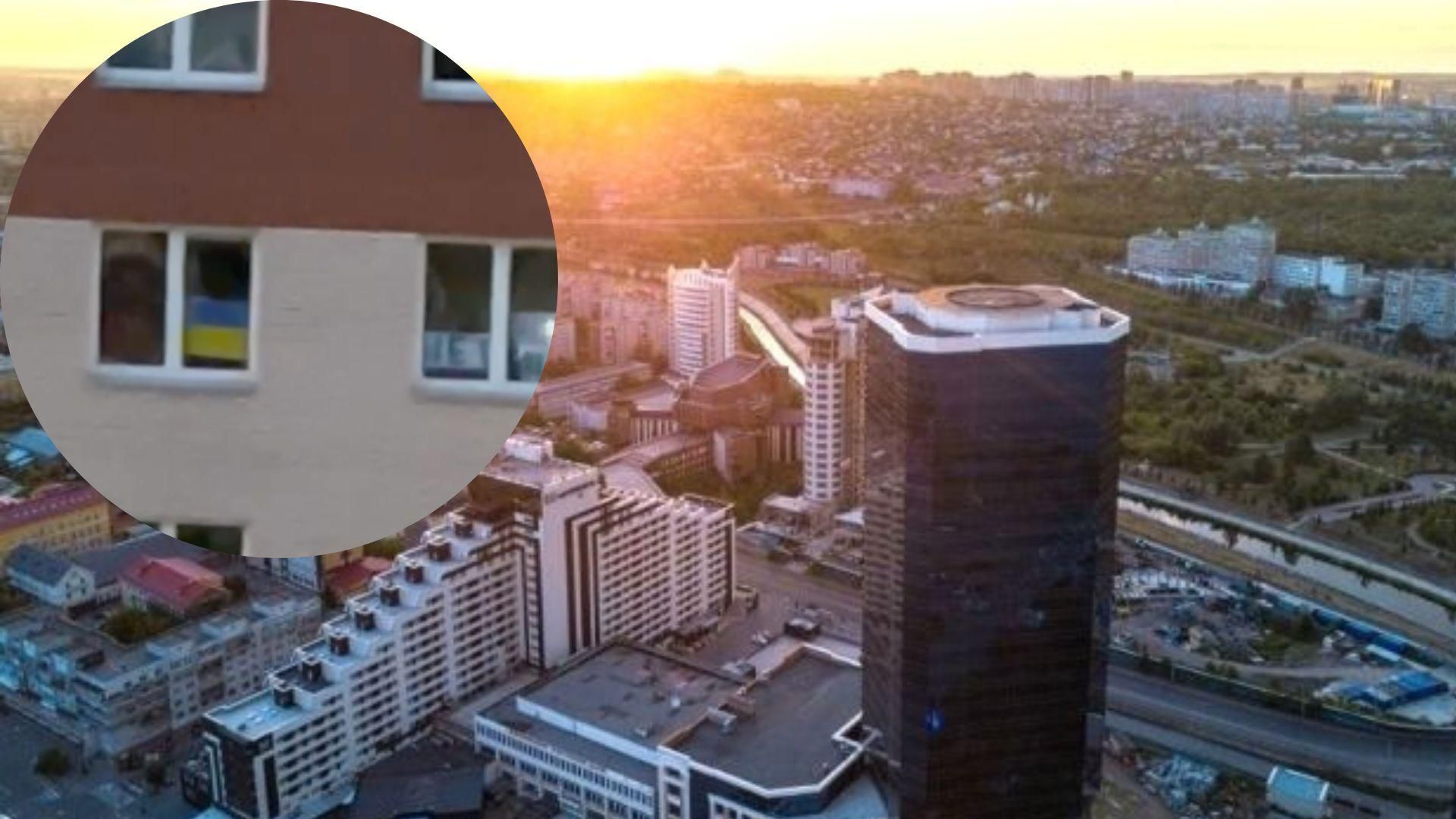 В российском Красноярске жителям закрасили окна из-за вывешенного флага Украины В российском Красноярске жителям закрасили окна из-за вывешенного флага Украины