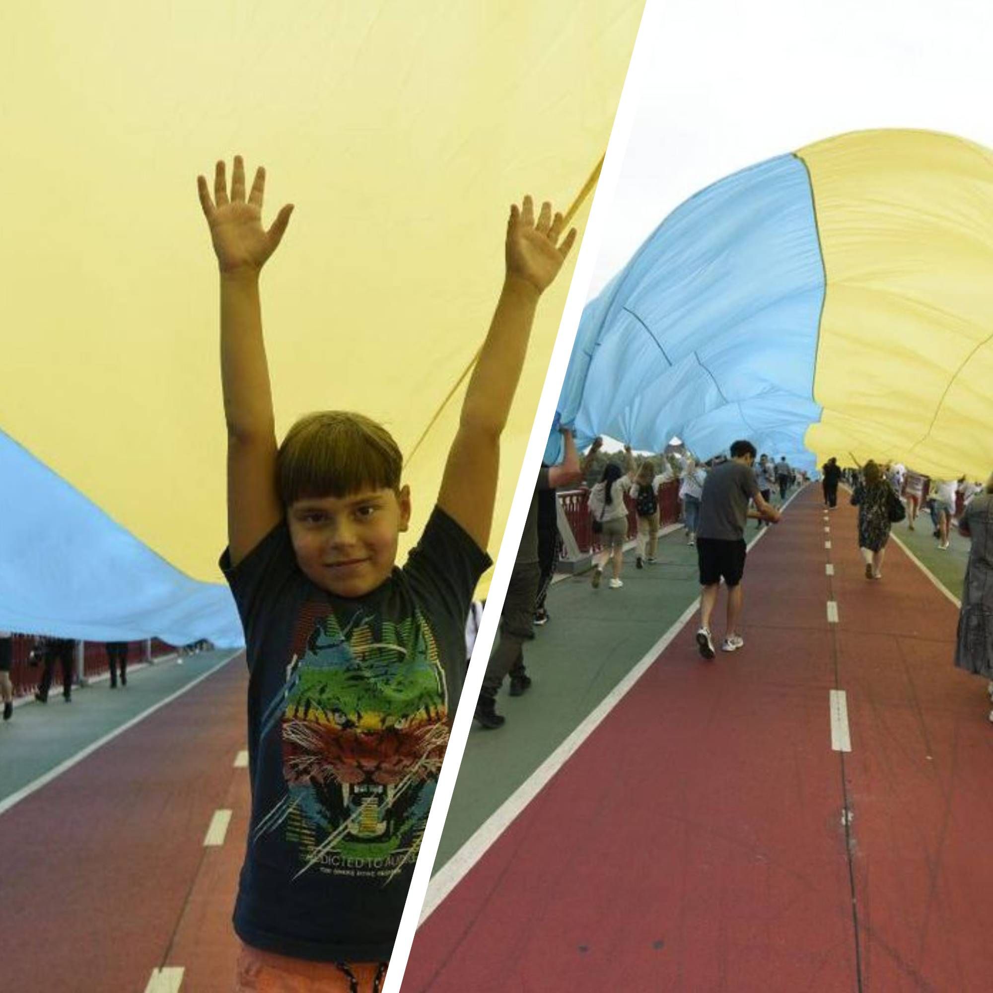 Український прапор - як у Києві через Парковий пішохідний міст розгорнули прапор Український прапор - як у Києві через Парковий пішохідний міст розгорнули прапор