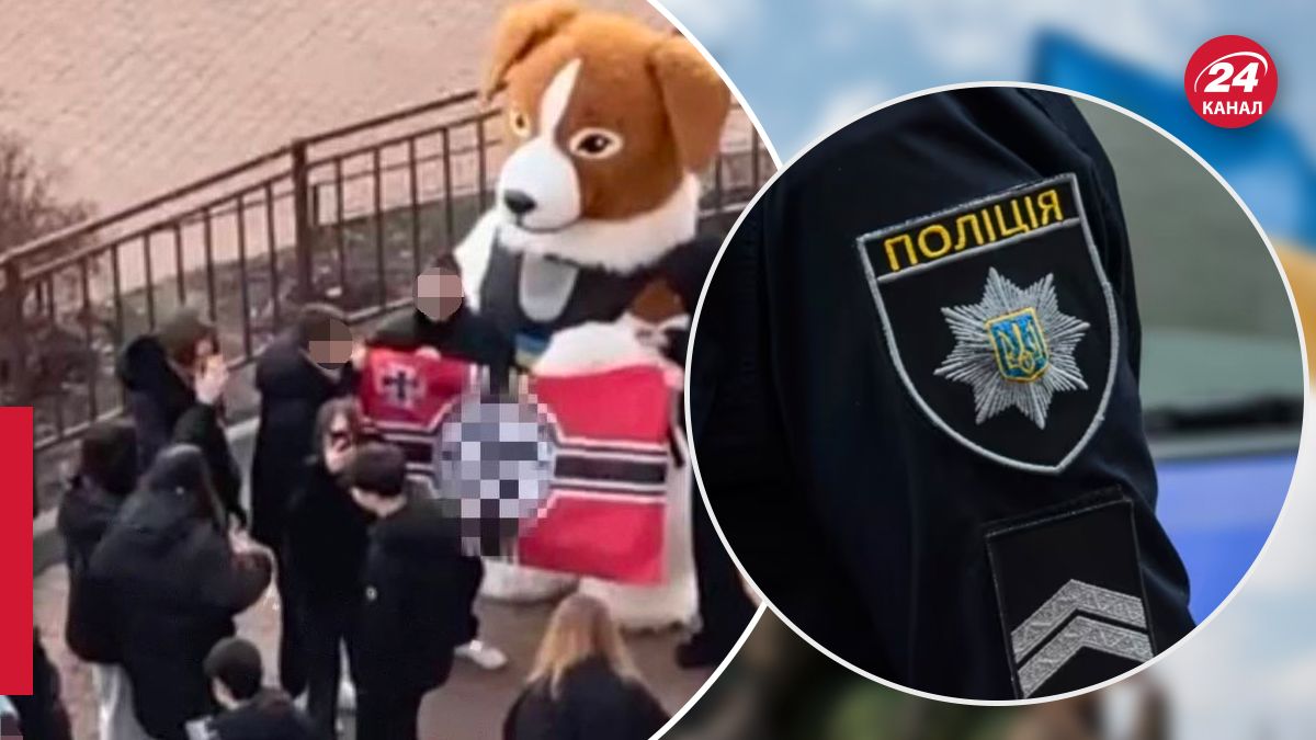 Полиция заинтересовалась подростками, развернувшими флаг с нацистской символикой Полиция заинтересовалась подростками, развернувшими флаг с нацистской символикой