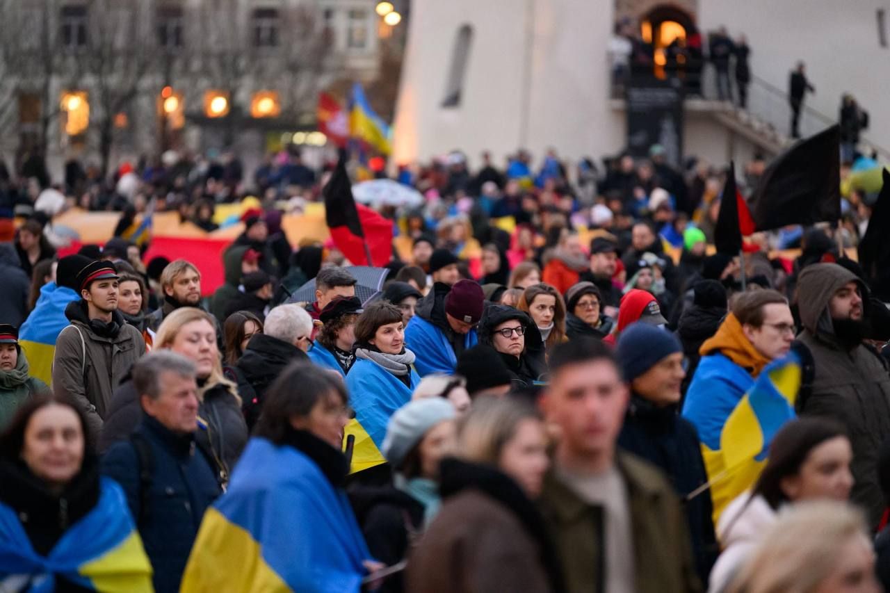 Учасники акції Make Russia Pay