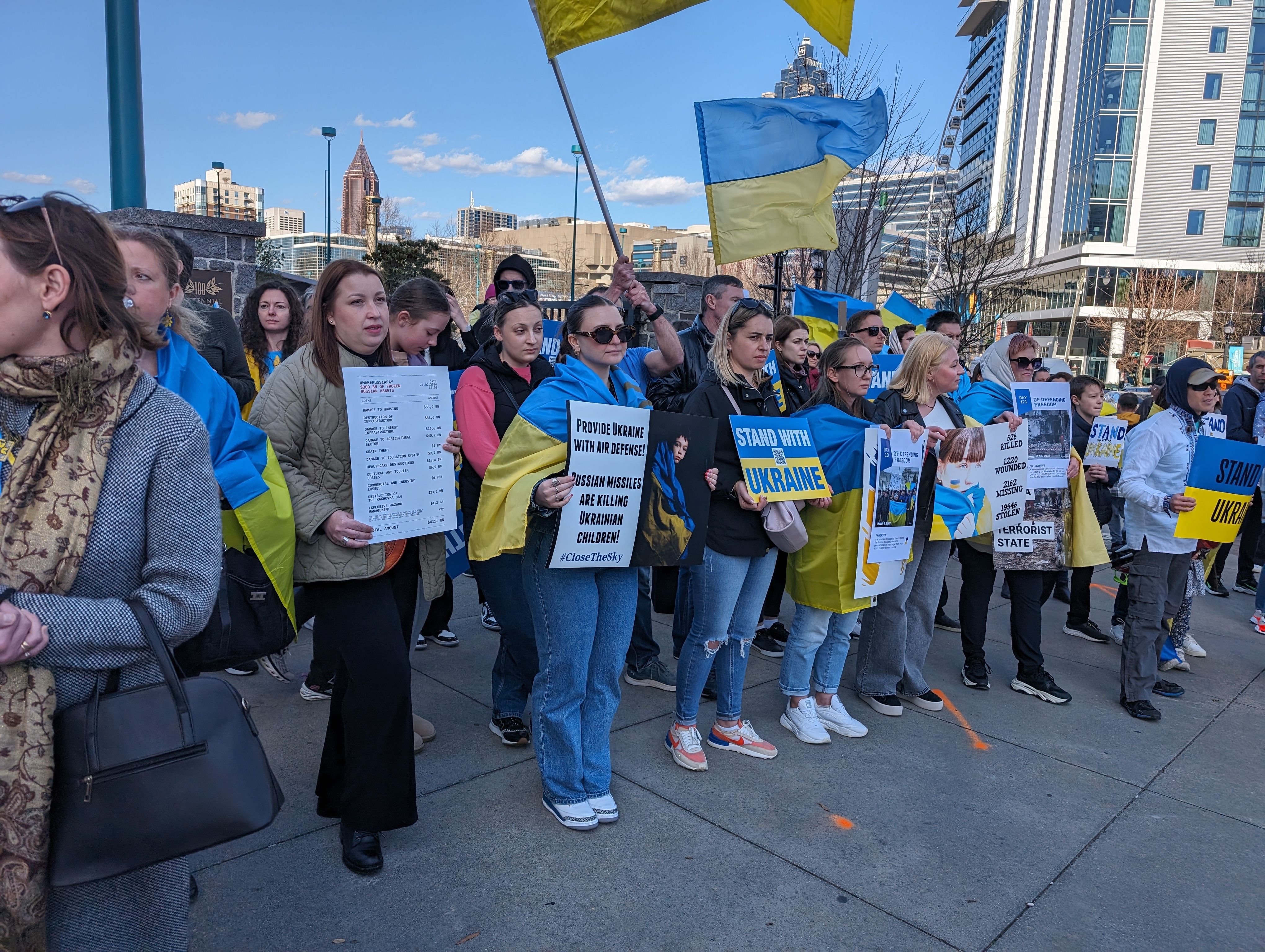 Учасники акції Make Russia Pay