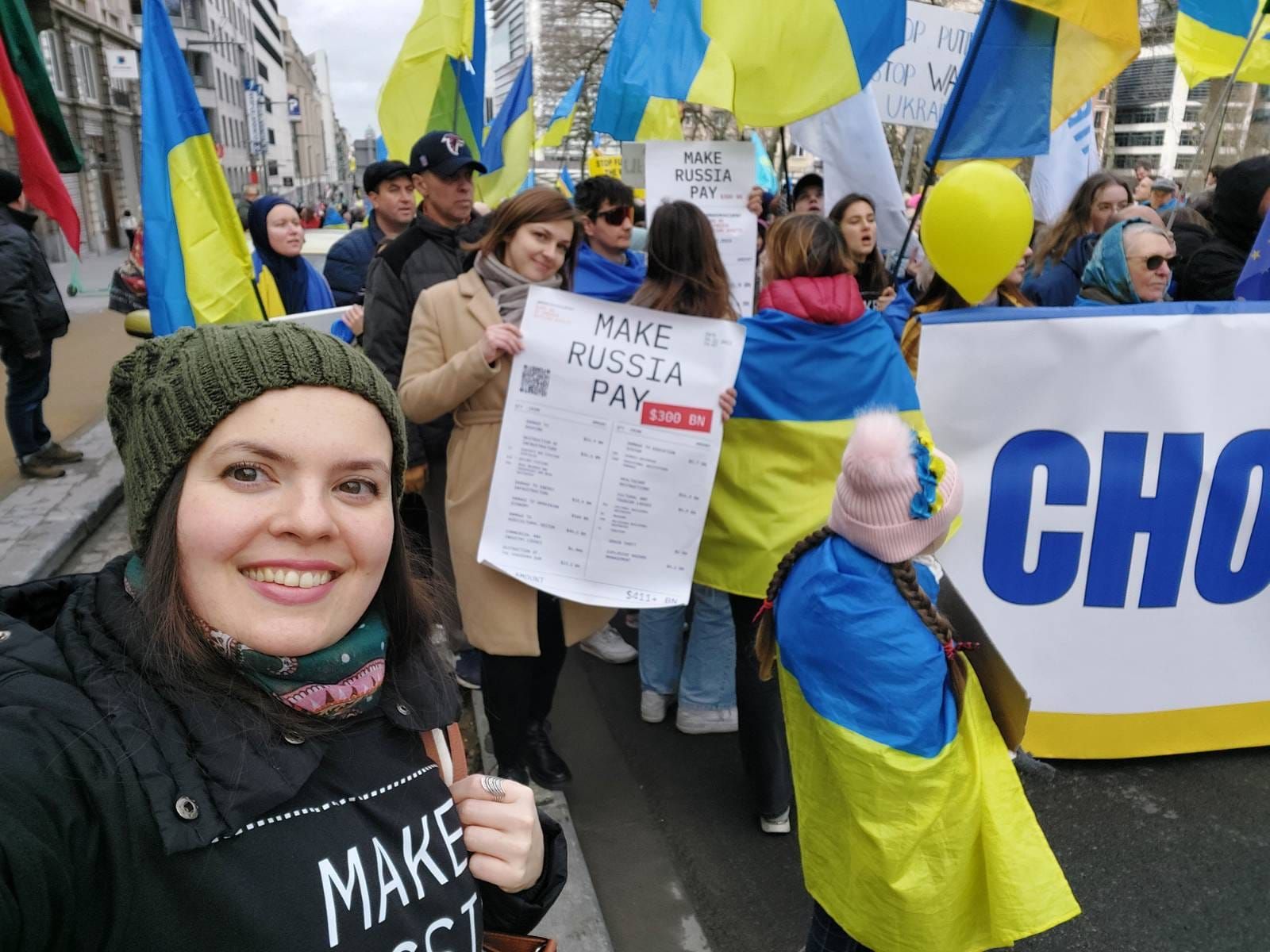 Учасники акції Make Russia Pay