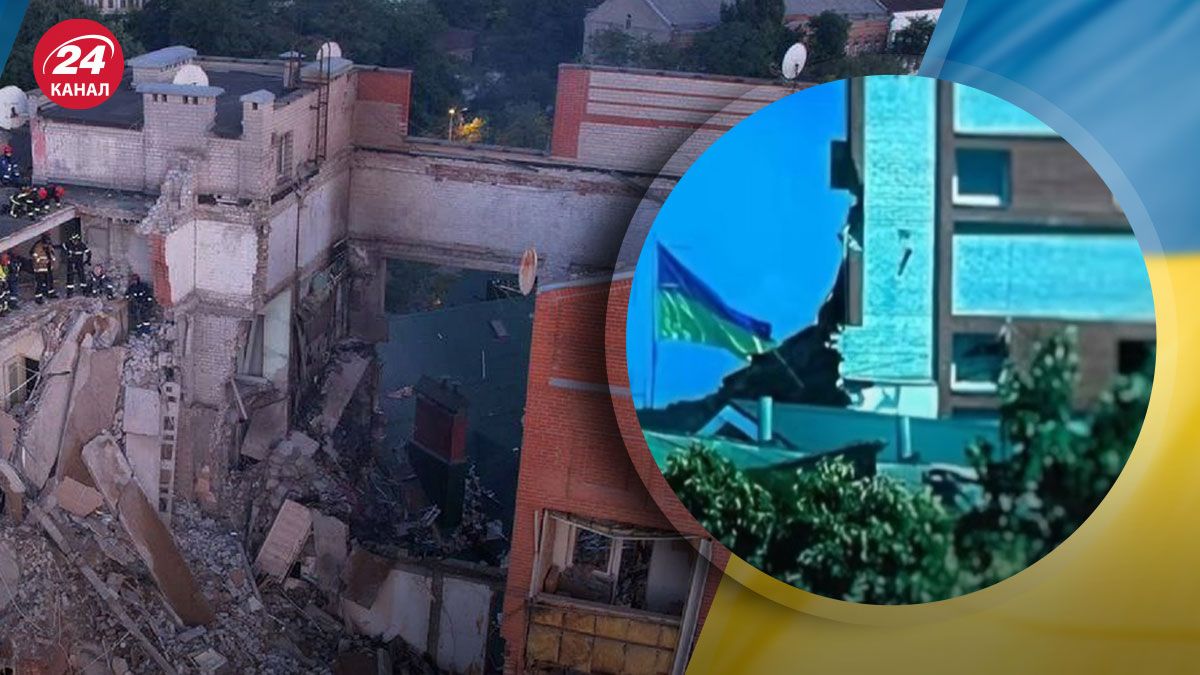 Крізь руїни зруйнованого в Дніпрі будинку майорить український стяг