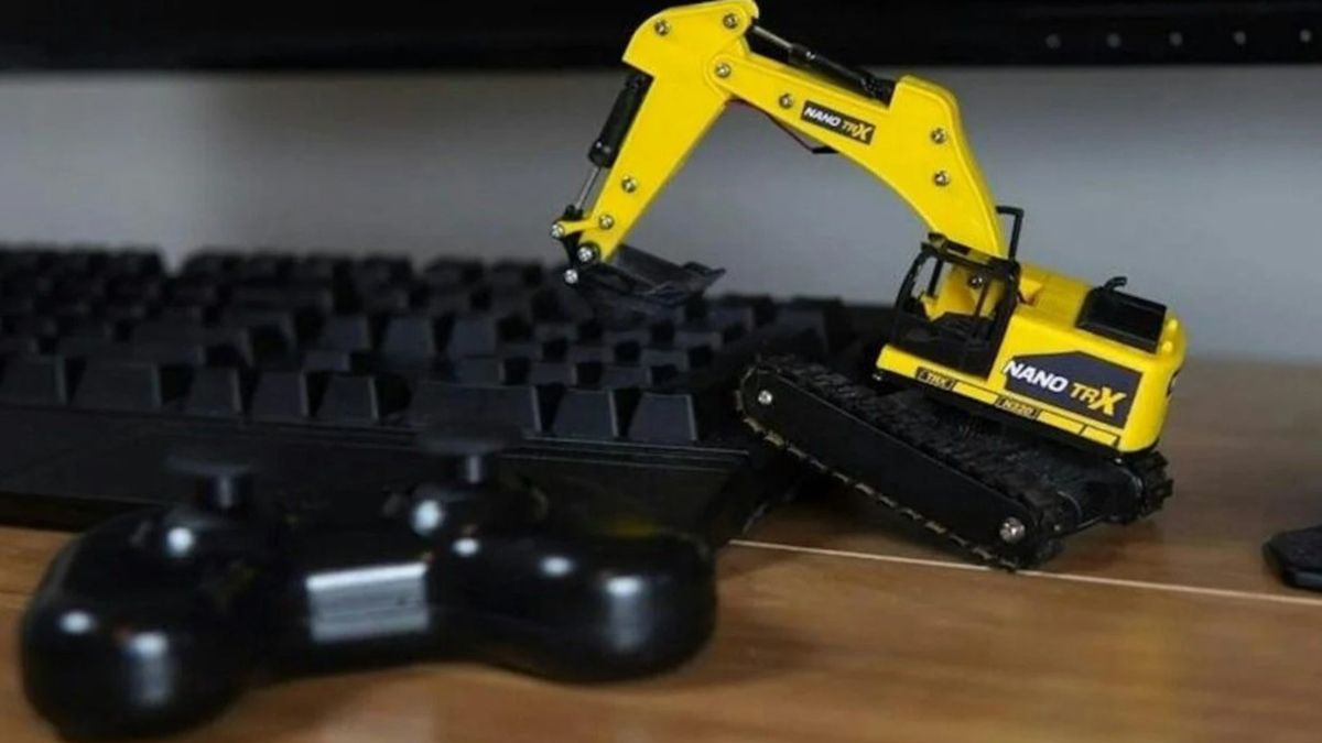 Как выглядит самый маленький в мире экскаватор - фото Как выглядит самый маленький в мире экскаватор - фото